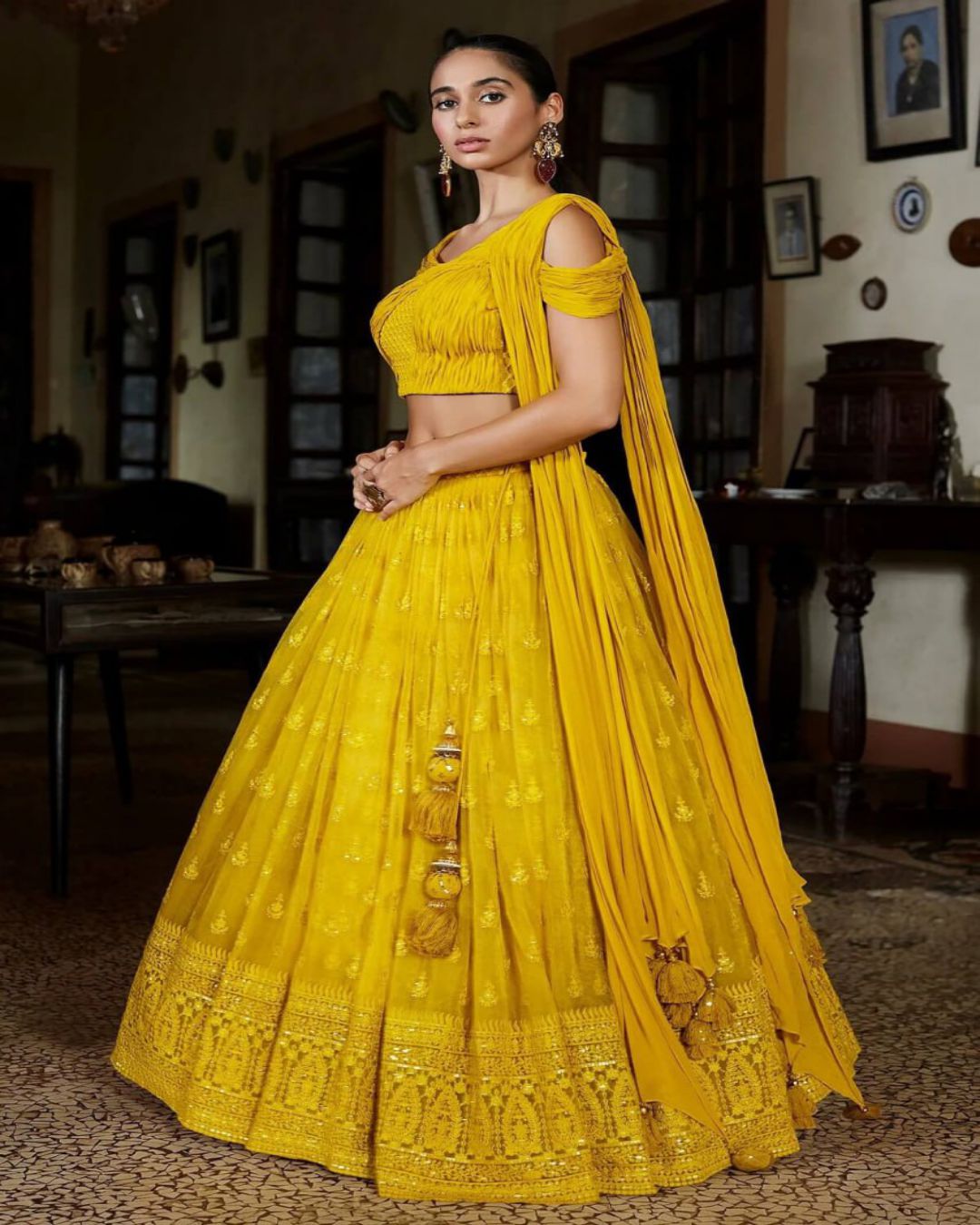 Citrine Yellow Sequins Embroidered Net Party Wear Lehenga