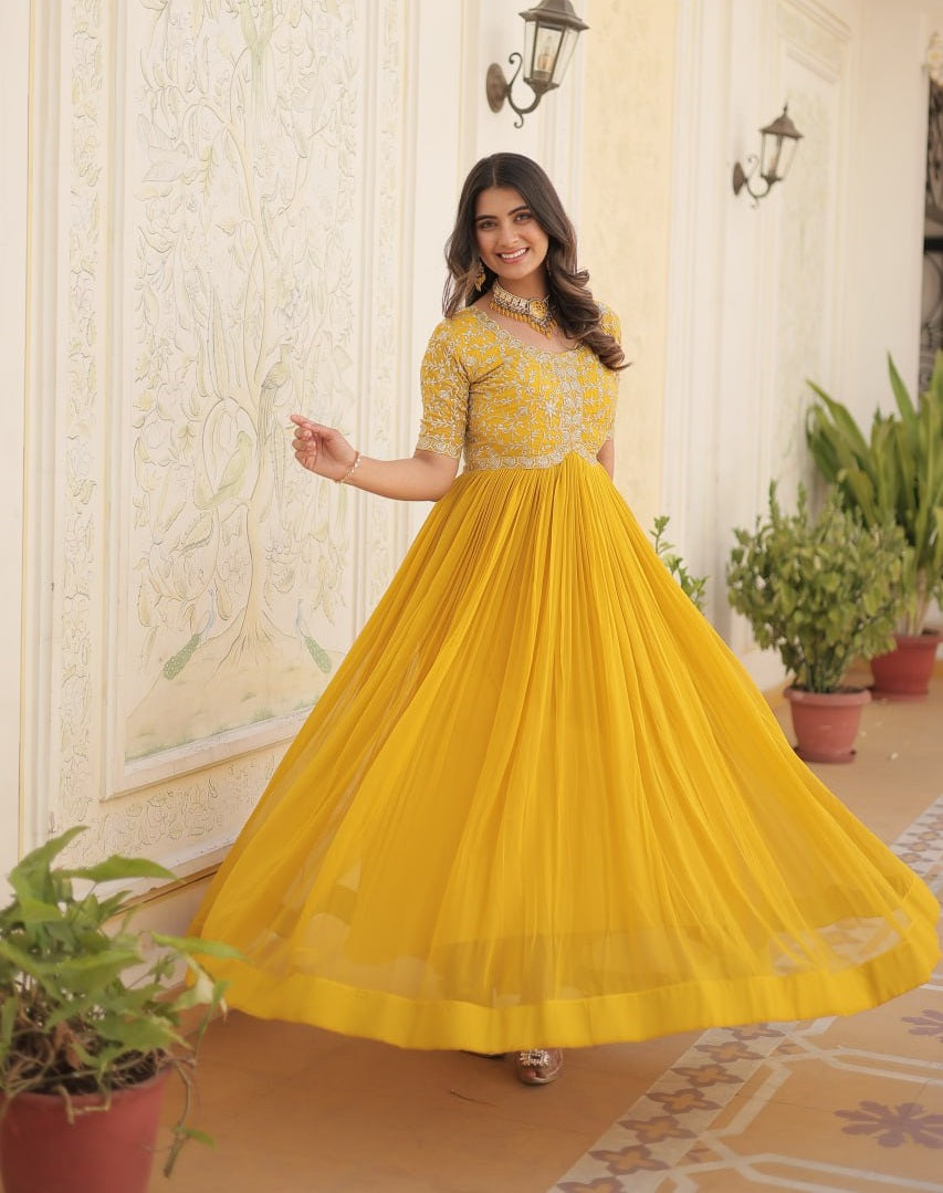 Glamorous Yellow Embroidered Georgette Haldi Wear Gown