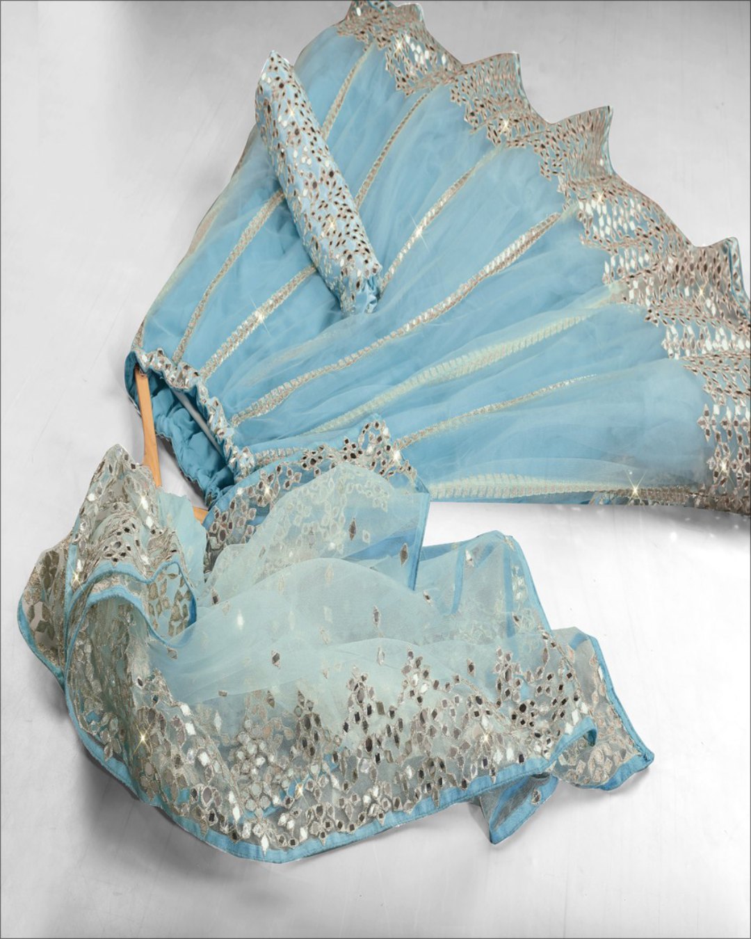 Exquisite Sky Blue Color Soft Net Base Flared Lehenga Choli